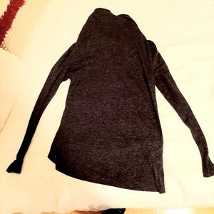 Asymmetrical high neck.light sweater